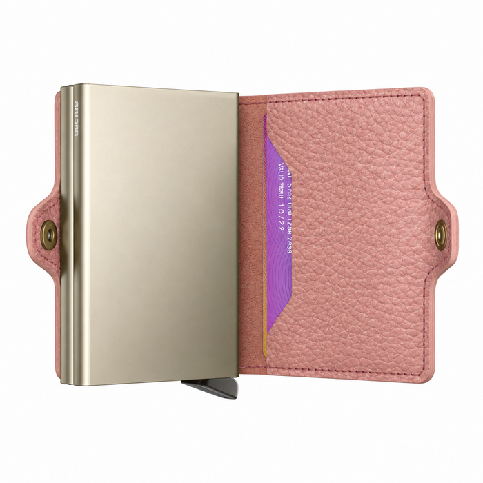 A pink pebbled leather Secrid cardholder wallet shown open, with a slim metallic card case inside and a slot for extra cards.