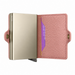 A pink pebbled leather Secrid cardholder wallet shown open, with a slim metallic card case inside and a slot for extra cards.