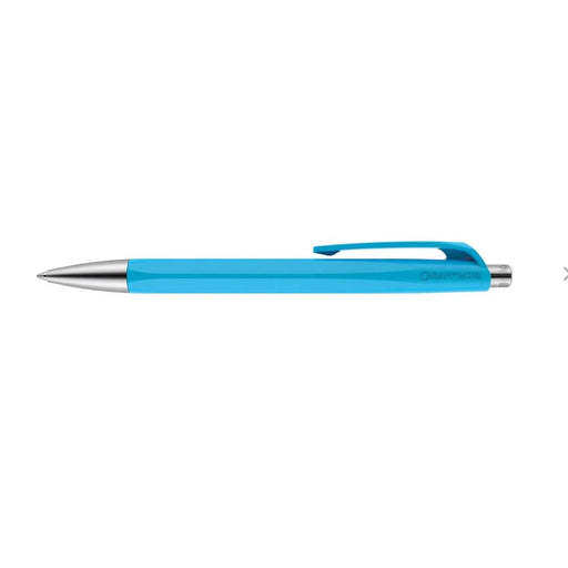 Caran d'Ache 888 Infinite ballpoint pen in turquoise, featuring an ergonomic-hexagonal resin body with metal fittings and push-button mechanism. Ident No. 888.171