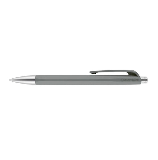 Caran d'Ache 888 Infinite ballpoint pen in grey, featuring an ergonomic hexagonal resin body with metal fittings, flexible clip and push button mechanism. Ident no.  Caran d'Ache 888.409
