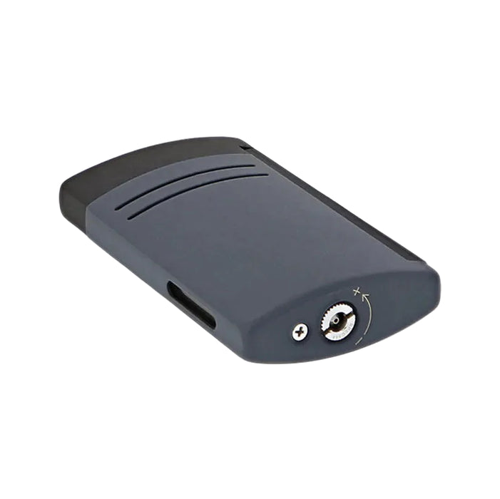 The bottom of  an S. T. Dupont Maxijet torch lighter in matte grey and black finish. A luxury-pocket lighter featuring a sleek, modern, ergonomic design featuring the fuel refill valve, the flame-adjustment screw and the built-in fuel-level window. Model 020166