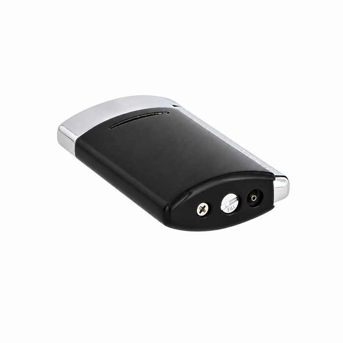 A sleek shiny black  S. T. Dupont Minijet lighter with polished chrome-finish accents. A pocket-size luxury lighter with a vertically integrated side-squeeze ignition trigger and a compact, ergonomic design, featuring the fuel-refill valve and the flame-adjustment control. Model 010885