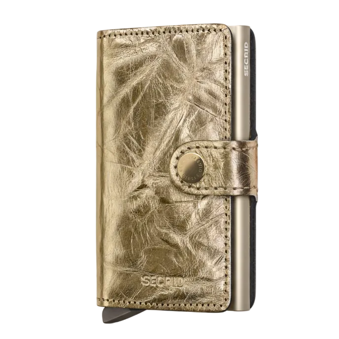 Gold wallet with metallic finish on a white background