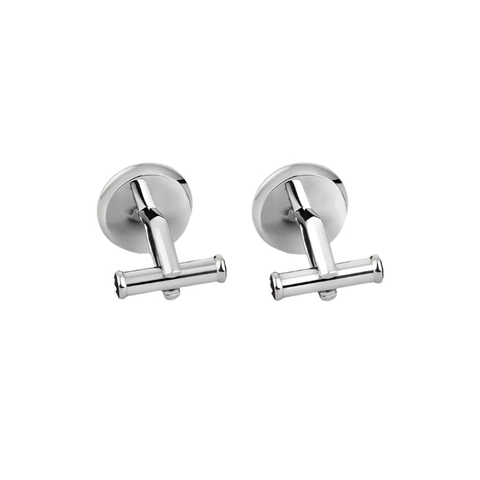 Pair of silver cufflinks on a light gray background