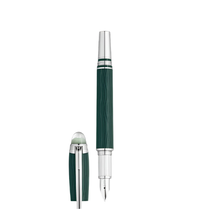 Fountain pen with green and silver design on a white background