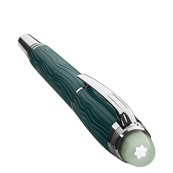 Luxury pen with green and silver design on a light gray background