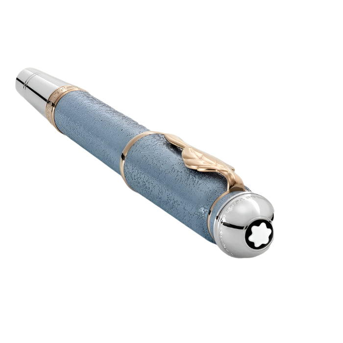 Montblanc Goethe Luxury pen with blue textured body, silver cap, and gold accents on a light gray background
