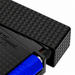 A close up of a diamond-head guilloche pattern black S. T. Dupont lighter with a blue striker. A luxury dual-flame lighter, perfect for cigar smoking. Model C23071