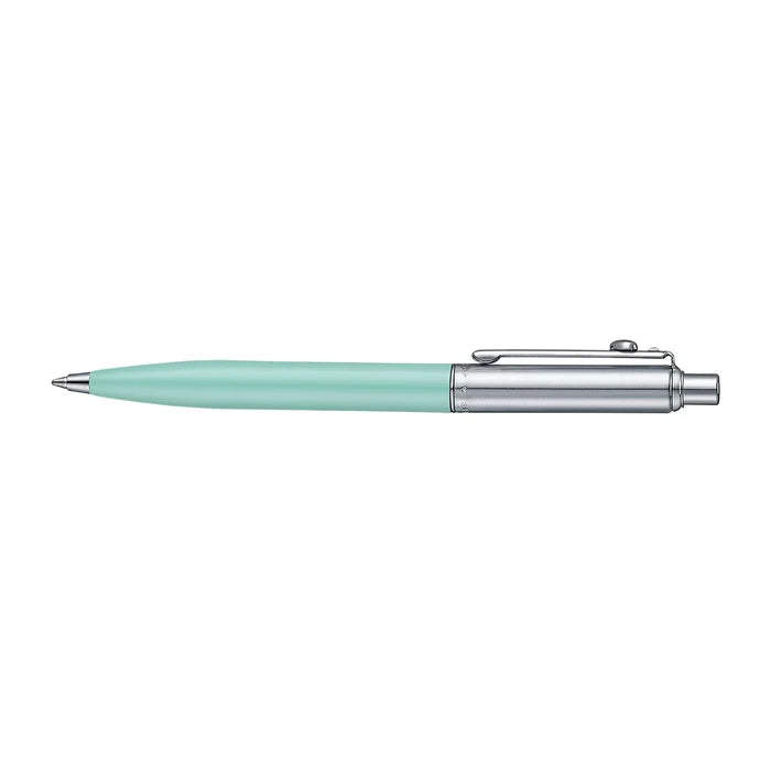 A slim Sheaffer Sentinel Emily in Paris ballpoint pen in a matte green finish with chrome plated trims and a heart-shape clip emblem. Model E232151