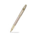 A sleek Sheaffer 100  Emily in Paris rollerball pen in a metallic champagne gold lacquer finish with champagne gold  trims and adorned with a bow-shaped emblem on the clip. Model E1937751
