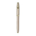 A sleek Sheaffer 100  Emily in Paris rollerball pen in a metallic champagne gold lacquer finish with champagne gold  trims and adorned with a bow-shaped emblem on the clip. Model E1937751